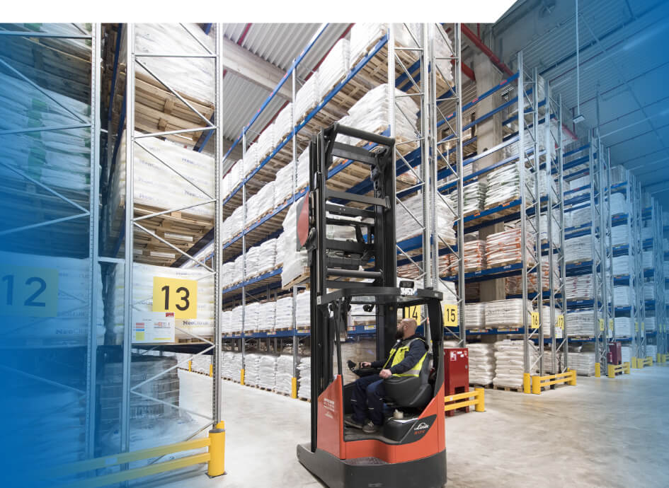 Storage Forklifts in front of storage racks